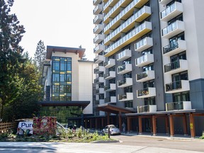 The Kiwanis Lynn Woods affordable housing complex, left, is run by the Kiwanis North Shore Housing Society in North Vancouver.