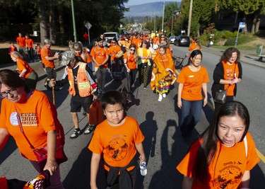 Several hundred people took part in a march to recognize the National Day for Truth and Reconciliation in North Vancouver, BC Friday, September 30.  The march began at St. Thomas Aquinas Regional Secondary school and wound through North Vancouver to the Tsleil-Waututh Nation reserve. 
(Photo by Jason Payne/ PNG)