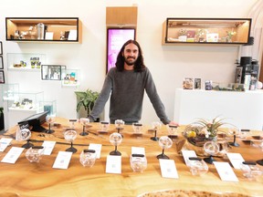 Jared Barney, assistant store manager at City Cannabis Co. on Sunday.