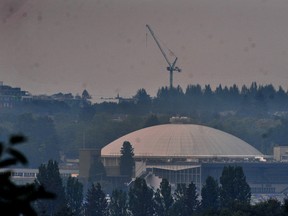 Poor air quality seen over Vancouver due to wildfires and a fire at a wood lot in Vancouver, BC., on September 11, 2022.