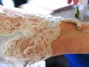 Angela Hoy shows off a silkworm