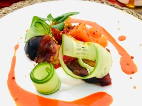 The organic heirloom tomato salad, courtesy of Baker Breeze Farm, part of the Meet the Farmer long table dinner.