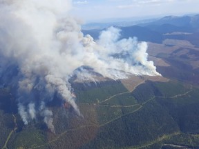 The Battleship Mountain wildfire burns in the Prince George Fire Centre in this Thursday, Sept. 15, 2022 handout photo. An evacuation order for B.C.s largest wildfire has been rescinded, though the BC Wildfire Service reporting the blaze remains out of control.