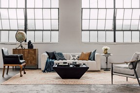 The Tommy Smythe collection with Urban Barn, featuring the Mosely sofa, Bixby cabinet, Dumont coffee table, Rowe armchair, Tommy X UB glass candle holder, black tray, bandana print, black vegan leather, paisley, printed scarf, tanned vegan leather and striped pillows and quilted throw.