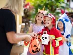Canadians will still spend about $25 per household on Halloween candy this year, amounting to about $486 million nationally.