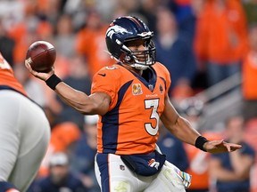 Russell Wilson of the Denver Broncos passes during a game against the Indianapolis Colts at Empower Field At Mile High on Oct. 6, 2022 in Denver, Colorado.