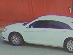 On October 20, 2022 Surrey RCMP received a report of bullet holes in a fence on 72 Avenue. Police want help identifying the suspect vehicle, a white, four door sedan seen here. Photo: RCMP