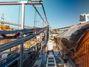 The conveyer belt rises out of the future Great Northern Way-Emily Carr station site towards the muck pit on the other side, where excavated material will be removed.