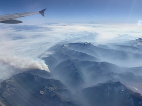 Wildfire smoke and haze from a blaze burning near Mount Baker in Washington state is seen from an airplane on Thursday, Oct. 13, 2022.