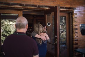 Canuck Place Parent Hollie Hall hugging Canuck Place Counsellor, Andrea Johnson