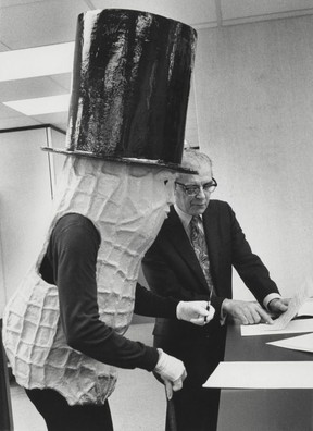 Mr. Peanut (Vincent Trasov) signs the nomination papers to run for the mayor of Vancouver, Oct. 30, 1974.