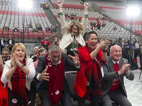 Vancouver Coun. Rebecca Bligh, Pavco CEO Ken Cretney, then-tourism minister Melanie Mark and Minister for Public Safety and Solicitor General Mike Farnworth celebrate as Vancouver is announced as a FIFA World Cup 2026 host city in June 2022.