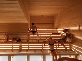 A group facing the hot temperature exposure in the sauna. PHOTO SUPPLIED.
