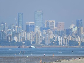 File photo: The city of Vancouver is seen through a haze during a heat wave.