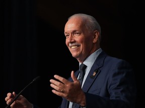 B.C. Premier John Horgan makes an address, in Whistler, B.C., on Friday, Sept. 16, 2022. Horgan says it's laughable for the new premier of Alberta to suggest unvaccinated people are the most discriminated-against group in her lifetime.