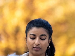 B.C. NDP leadership candidate Anjali Appadurai pauses for a moment as she addresses the media during a news conference in downtown Vancouver on Wednesday.