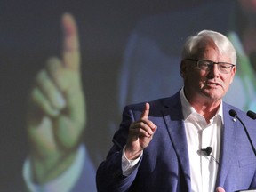 We spent 10 minutes chatting about life in general and what it's like to not be the premier anymore," Premier John Horgan said of a recent chat with former B.C. premier Gordon Campbell, who is pictured at a conference in Banff in 2018.