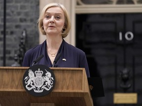 Britain's Prime Minister Liz Truss addresses the media in London, Thursday, Oct. 20, 2022. Truss says she resigns as leader of UK Conservative Party. More political tumult in Britain is likely to further stall trade talks with Canada, experts say. THE CANDIAN PRESS/AP-Alberto Pezzali