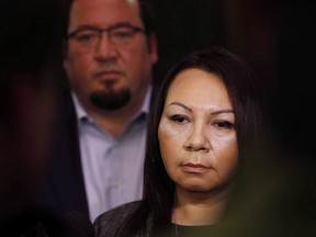 Sheila North Wilson, right, grand chief of Manitoba Keewatinowi Okimakanak, speaks to media as Derek Nepinak, grand chief of the Assembly of Manitoba Chiefs, listens in after RCMP announced at a press conference in Winnipeg, March 18, 2016. More than a year after North unsuccessfully ran to lead one of Manitoba's largest First Nations political organizations, the Cree leader and journalist is ready to try again.