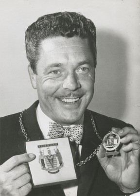 Frank Baker shows off his Vancouver alderman pin. June 17, 1960. Vancouver Sun files.