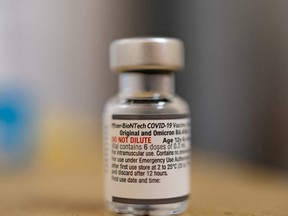 A vial of the Pfizer-BioNTech coronavirus disease booster vaccine targeting BA.4 and BA.5 Omicron sub variants. The vaccine has just been approved for Canada.