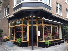 Giant letters were spray-painted on the windows and doors of Finch's Market in Vancouver's Strathcona neighbourhood last week.