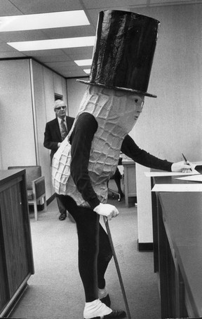 Peanut Party candidate Mr. Peanut, aka artist Vincent Trasov. Mr. Peanut shelled out a $200 deposit and filed nomination papers at City Hall in Vancouver. A Mr. Peanut supporter said that, ‘People are used to electing nuts.’ October 30, 1974.