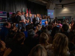 Ken Sim celebrates after winning the Vancouver mayoral race