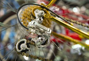Details from a bike, most of which are in pristine condition.