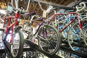 There are so many bikes on sale that they have been mounted on racks.