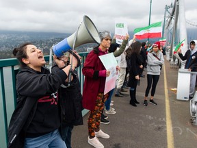 Thousands of people line Stanley Park Causeway and across the Lions Gate Bridge Saturday, October 29, 2022 to take part in the Human Chain for Iran protest.
