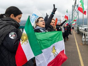 Thousands of people line Stanley Park Causeway and across the Lions Gate Bridge Saturday, October 29, 2022 to take part in the Human Chain for Iran protest.