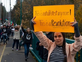 Thousands of people line Stanley Park Causeway and across the Lions Gate Bridge Saturday, October 29, 2022 to take part in the Human Chain for Iran protest.