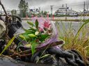 Flowers are seen at the anchor outside the BC Ferry maintenance yard in Richmond after a worker fell down a ramp and drowned in June 2020.