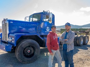 Eric Little, left, and Chace Barber of Edison Motors in Merritt with one of their diesel-powered electric logging trucks.
