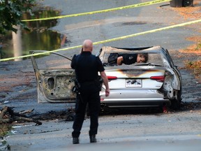 Police and fire department on the scene of a vehicle fire in the south lane of West 20th Avenue at Crown Street in Vancouver.