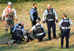 BURNABY, BC., October 18, 2022 - Burnaby RCMP have one in custody following an incident on Canada Way in Burnaby, BC., on October 17, 2022. 
Two people were taken to hospital with no further details available.

(NICK PROCAYLO/PNG) 

00098076A [PNG Merlin Archive]