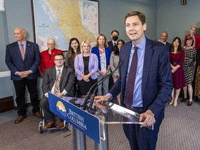 B.C. NDP premier-designate David Eby, foreground, and Premier John Horgan in Victoria on Oct. 24.