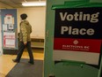 People vote at Grandview school during the 2020 British Columbia general election.