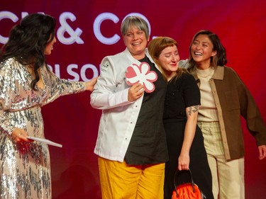 VANCOUVER, BC - October 27, 2022 -  Emcee Mijune Pak with Andrea Carlson of Burdock & Co. (white jacket)  at Michelin Guide awards at Vancouver Trade and Convention Centre West in Vancouver, BC, October 27, 2022. The MICHELIN Guide will bestow awards upon the finest restaurants in Vancouver.
(Photo: Arlen Redekop / PostMedia) (Story by Mia Stainsby) [PNG Merlin Archive]