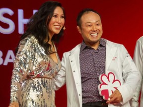 Sushi master Masayoshi Baba (right) of Masayoshi, with event emcee Mijune Pak, after learning his sushi restaurant had been awarded a Michelin star at the Michelin Guide awards in Vancouver last week.