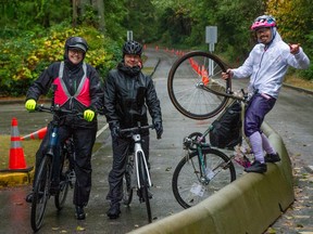 Lucy Maloney (left) of Love For The Lane, with fellow members Cory Siemens and Matt Stardust in Stanley Park's dedicated bike lane on Sunday.