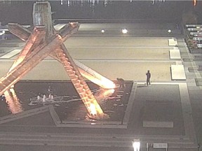 Screenshot from Vancouver Police from video footage that captures two suspects involved in the vandalism of the Olympic Cauldron on Saturday.