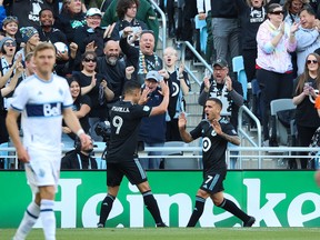Minnesota United midfielder Franco Fragapane (7) celebrates a goal against the Vancouver Whitecaps during the first half at Allianz Field.
