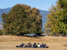 People enjoy the outdoors in very dry conditions in Stanley Park on Wednesday.