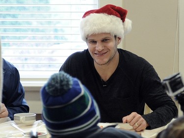 18-year-old Josh Rumor from Terrace is gets a wish fulfilled via the Children's Wish Foundation by meeting Vancouver Canucks player Kevin Bieksa in Vancouver, BC., December 19, 2014.