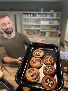 Patrick Novak shows a few varieties of kolache from his new bakery in Prague.  The café Kolacherie specializes in both sweet and savory versions of the traditional Czech treat.