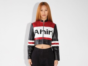 A model wears the Logo Leather Racing Jacket, $269, from the Canadian brand Ahiri.
