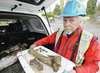 Ed Davies with old bison bones found at the excavation site for a new Nigel House near Saanich Municipal Hall.
