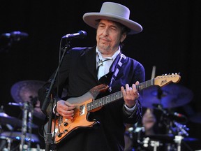In this file photo taken on July 22, 2012 Bob Dylan performs on stage during the 21st edition of the Vieilles Charrues music festival in Carhaix-Plouguer, France.